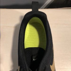 Nike Shoes - Black with gold Nike swoosh Nike Shoes - Black with gold Nike swoosh